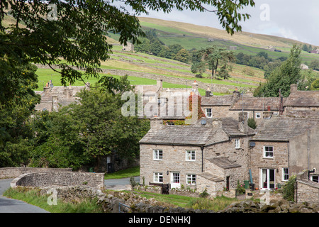 The pretty Swaledale village of Thwaite, Yorkshire Dales National Park,  Richmondshire, North Yorkshire, England, UK Stock Photo