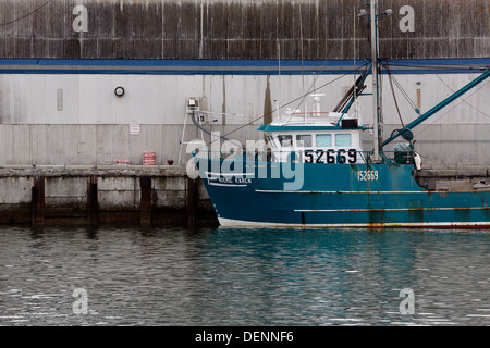 Commercial fishing boat in the harbor, Rivière-au-Renard, Québec, Canada Stock Photo