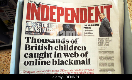 Independent newspaper front page headline 'Thousands of British children caught in web of online blackmail' UK 12 July 2013 Stock Photo