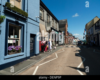 A view of the narrow road of Rhosmaen St looking north with small shops and pedestrians in summer Llandeilo Carmarthenshire WALES UK KATHY DEWITT Stock Photo