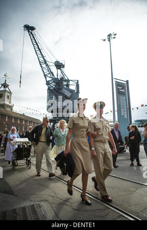 Chatham, UK. 21st Sep, 2013. Salute to the 40's - Britain's 1940's Home Front Event at The Historic Dockyard Chatham. Parade of vintage fashion for those in 1940's attire. Credit:  Tony Farrugia/Alamy Live News Stock Photo