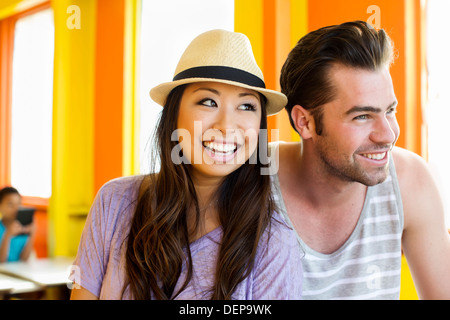Couple relaxing together in restaurant