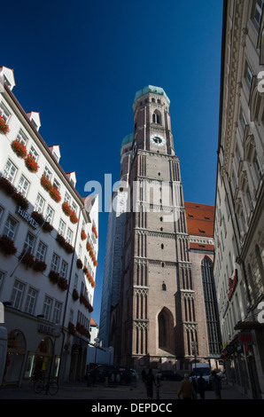 looking up at one of the twin towers of the frauenkirche in munich city centre Stock Photo