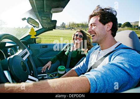 Couple driving in convertible Stock Photo