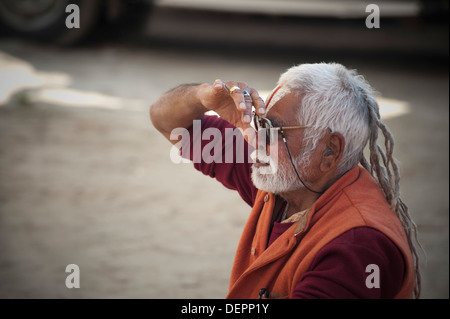 Sadhu doing yoga at Maha Kumbh, Allahabad, Uttar Pradesh, India Stock Photo