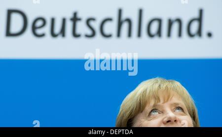 Berlin, Germany. 23rd Sep, 2013. German Chancellor and CDU chairwoman Angela Merkel speaks at the CDU press conference after the 2013 German federal elections in Berlin, Germany, 23 September 2013. Photo: JULIAN STRATENSCHULTE/dpa/Alamy Live News Stock Photo