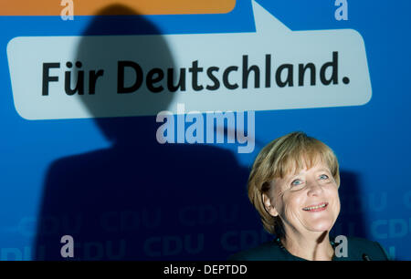 Berlin, Germany. 23rd Sep, 2013. German Chancellor and CDU chairwoman Angela Merkel speaks at a press conference after the 2013 German federal elections in Berlin, Germany, 23 September 2013. Photo: JULIAN STRATENSCHULTE/dpa/Alamy Live News Stock Photo