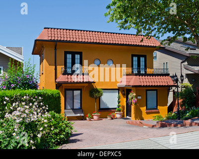 Spanish style home with vibrant warm colours in Burnaby, part of Greater Vancouver, Canada. Stock Photo