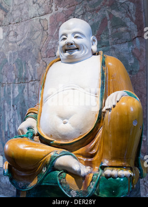 The British Museum, London - Ming Dynasty stoneware ceramic figure of Budai - the fat, happy monk Stock Photo