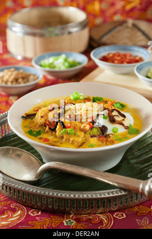 Spicy curry noodles soup with chicken (Khao Soi), Northern Thai food ...