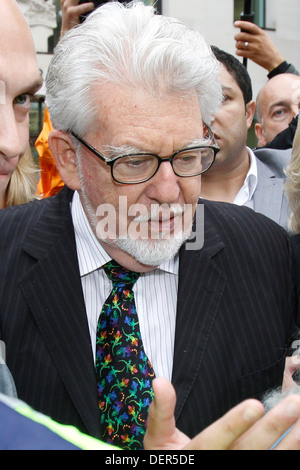 Australian entertainer Rolf Harris and his wife Alwen leave the City of Westminster Magistrates Courts in London, Britain Stock Photo