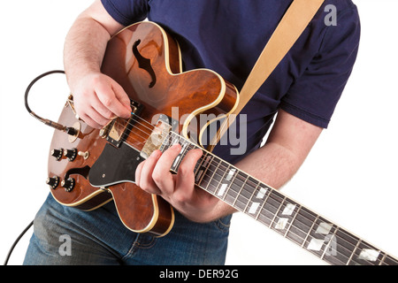 Young guitarist. Man playing an electric guitar Stock Photo