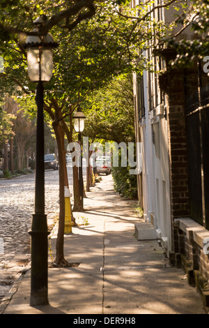 Historic cobblestone Chalmers Street in Charleston, SC. Stock Photo