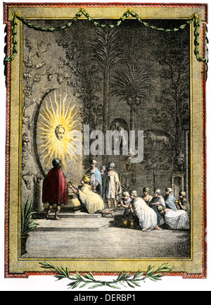 Aztecs worshiping in the Temple of the Sun. Hand-colored woodcut Stock Photo