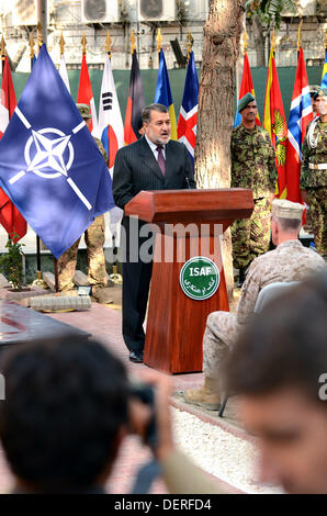 Afghan Defense Minister Bismillah Khan Mohammadi speaks at the unveiling ceremony of a memorial dedicated to fallen service members in the Afghan War September 23, 2013 in Kabul, Afghanistan Stock Photo