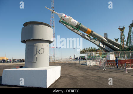 The Russian Soyuz rocket is lifted into position at the launch pad at the Baikonur Cosmodrome September 23, 2013 in Baikonur, Kazakhstan. Launch of the rocket carrying the Expedition 37 crew to the International Space Station is scheduled for September 26. Stock Photo