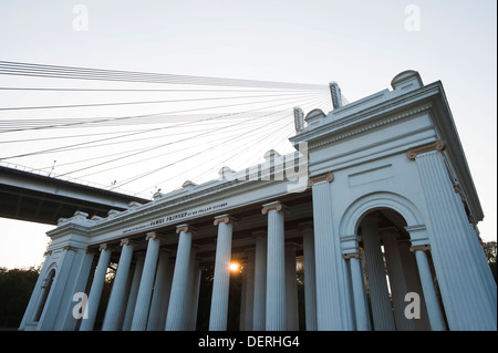 Low angle view of a memorial with bridge in the background, Prinsep Ghat, Kolkata, West Bengal, India Stock Photo