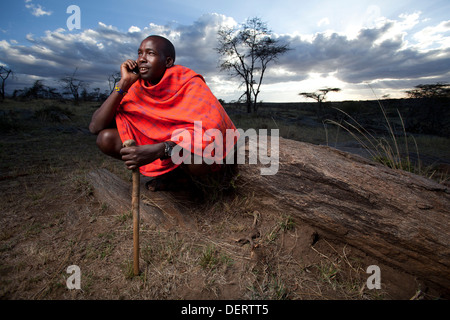 Maasai on mobile phone, Mara Region, Kenya Stock Photo