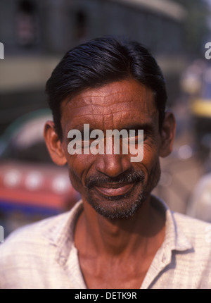 Head and shoulders portrait of middle-aged man with beard and moustache. Mumbai, India Stock Photo