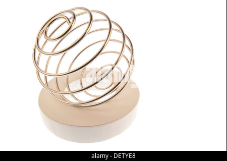 Iron wire tangled up into a spiral ball,lying tilted to the left on a white ring