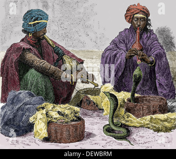 Asia. Indian. Snake charmers. Colored engraving. 19th century. Stock Photo