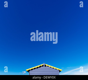 Blue beach hut and blue sky at Greatstone Beach, New Romney, Kent, UK. Stock Photo