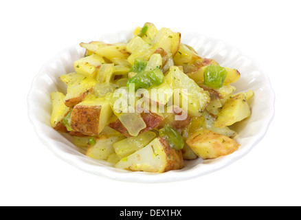 A small bowl filled with a serving of roasted red potatoes with onions and green peppers in a light butter sauce. Stock Photo