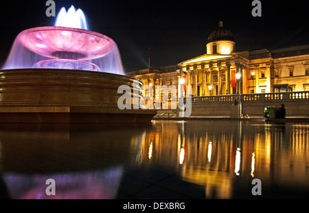 Trafalgar Square at night showing the National Gallery, West End, London, England, United Kingdom Stock Photo