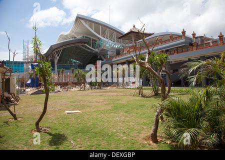 Ngurah Rai airport wing Denpasar Bali Indonesia new wing construction site modern traditional city tourist traffic brand Asia Stock Photo