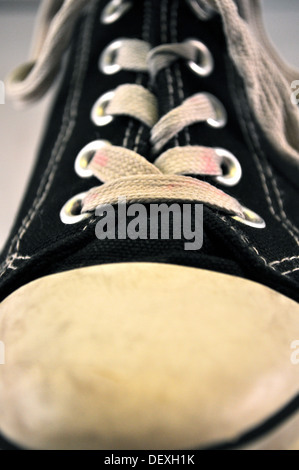 Black Tennis Shoe Front Perspective Stock Photo