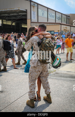 Marines with Marine All-Weather Fighter Attack Squadron 533 met their awaiting families and friends upon returning to Marine Corps Air Station Beaufort Sept. 13. Stock Photo