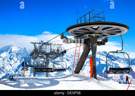 Ski lift chairs on bright winter day Stock Photo