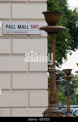 Pall Mall Street Sign on the side of a Building with Old Fashioned Street Light Stock Photo