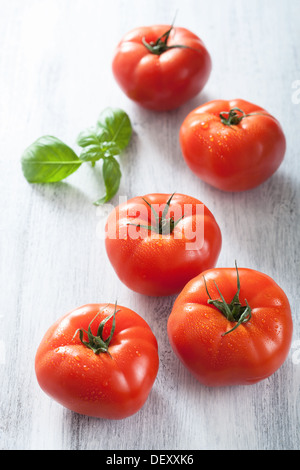 Ripe Wet Yellow Tomatoes with Leaves Isolated on White Background Stock ...