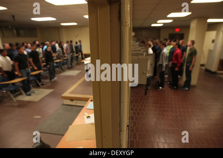 Recruits of Lima Company, 3rd Recruit Training Battalion, make phone calls shortly after arriving for training Sept. 16, 2013, o Stock Photo