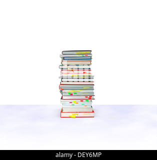 Stack of books with sticky notes Stock Photo