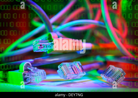 Computer cable and binary numeric code, Computerkabel und binärer Zahlencode Stock Photo