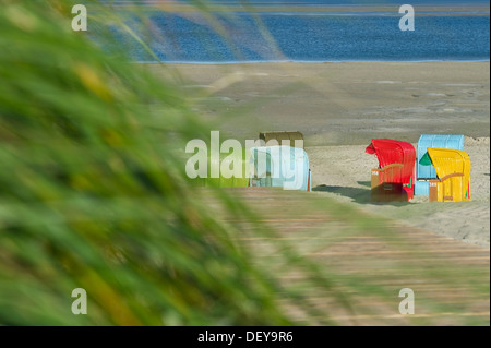 Colourful beach chairs on the beach of Utersum, Foehr island, North Frisia, Schleswig-Holstein Stock Photo