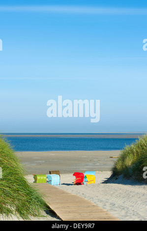 Colourful beach chairs on the beach of Utersum, Foehr island, North Frisia, Schleswig-Holstein Stock Photo