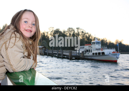 Little girl, three years, on a ship on Lake Chiemsee, Bavaria Stock Photo