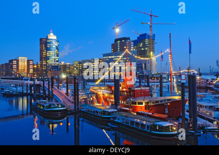 The lightship at the marina in the Hamburg harbor, in the back the HTC Hanseatic Trade Center, Hamburg Stock Photo