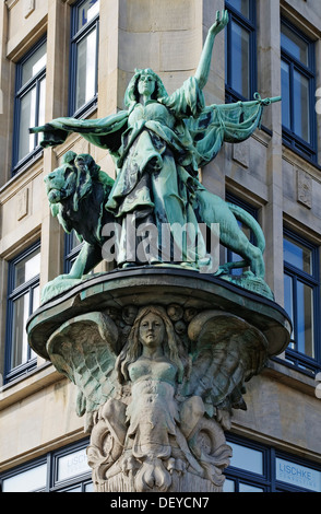 Sculpture on the facade of the Haus der Seefahrt building at the mouth of the Alster River called Nikolaifleet
