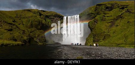 Waterfall and rainbow, Skogafoss, Skógar, Rangarþing eystra, Southern Region, Iceland Stock Photo