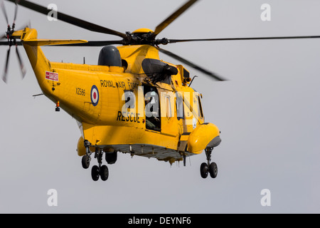 RAF YELLOW  SEARCH AND RESCUE SEA KING HELICOPTER IN FLIGHT Stock Photo