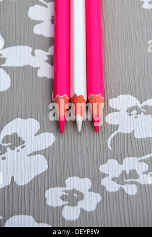 Several pencils on flowery background, creativity Stock Photo
