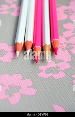 Several pencils on flowery background, creativity Stock Photo