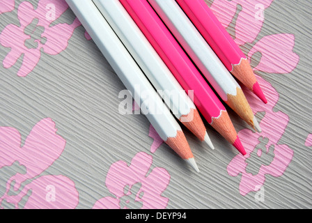 Several pencils on flowery background, creativity Stock Photo
