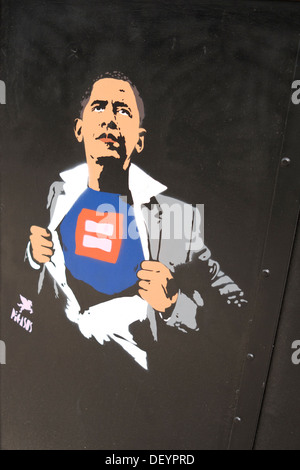 A stenciled graffiti image of President Barack Obama as a superhero. Stock Photo