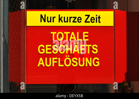 Nur kurze Zeit, Totale Geschaeftsaufloesung or Only a short time, total liquidation, sign, bankruptcy and limited time offers Stock Photo