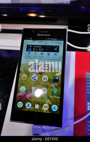 Beijing, China - 25 September, 2013, PT/ EXPO COMM China 2013, one of the largest and influential ICT and electronics science and technology exhibitions in Asia. People testing Lenovo new mobile phone k900. Credit:  momo leif/Ģ����ý Live News Stock Photo